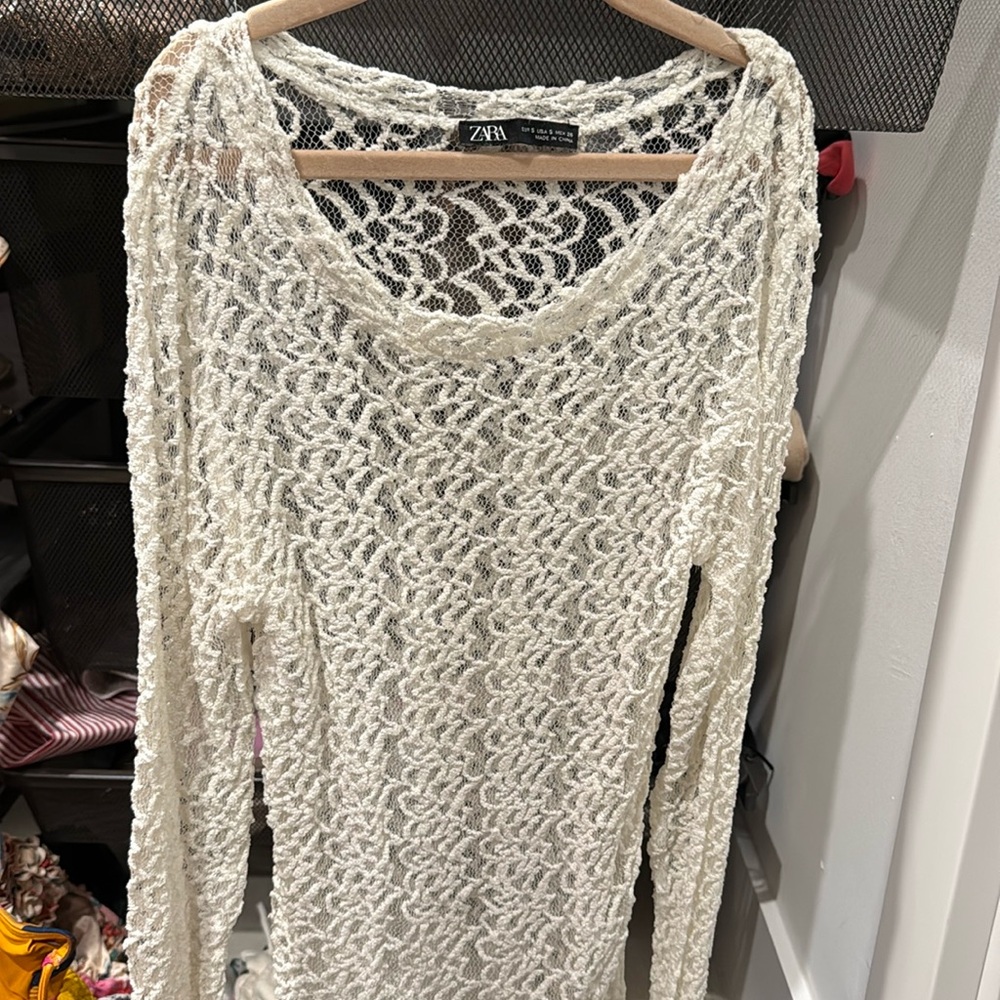 C-Through top perfect with a bralette underneath or bathing suit cover up